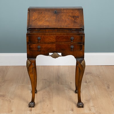 Lot 544 - A small mahogany bureau