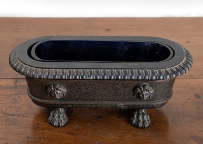 Lot 100A - A 19th century bronze salt in the form of a Roman sarcophagus