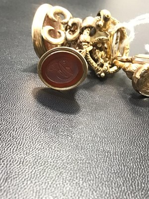Lot 84 - A collection of 19th century fob seals, with...
