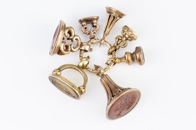 Lot 84 - A collection of 19th century fob seals, with...