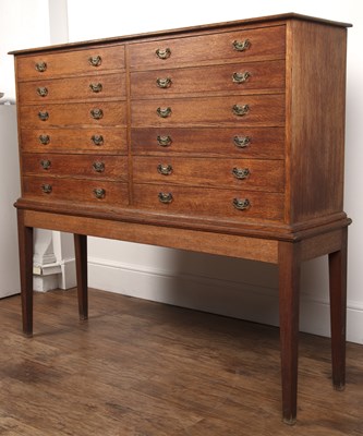 Lot 1 - Oak collectors cabinet on stand comprising...
