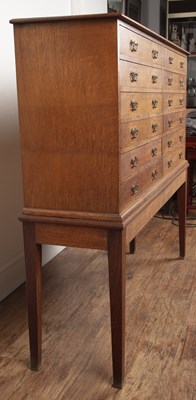 Lot 1 - Oak collectors cabinet on stand comprising...
