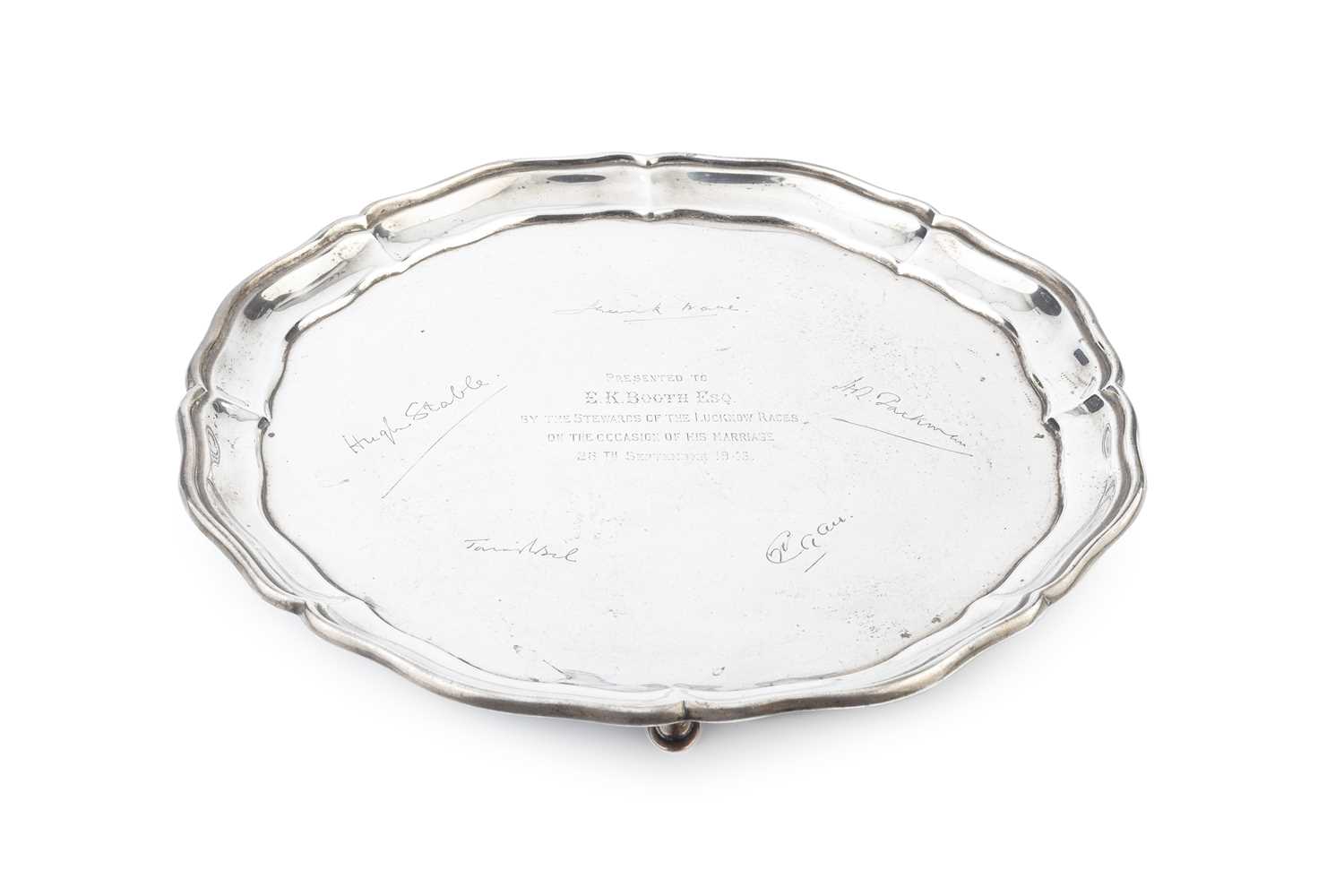 Lot 513 - An Indian silver salver, with shaped border,...