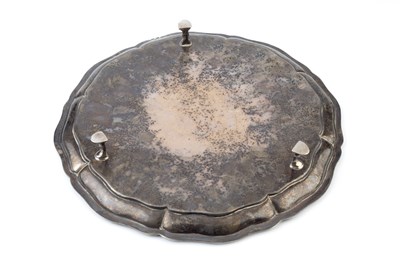 Lot 513 - An Indian silver salver, with shaped border,...