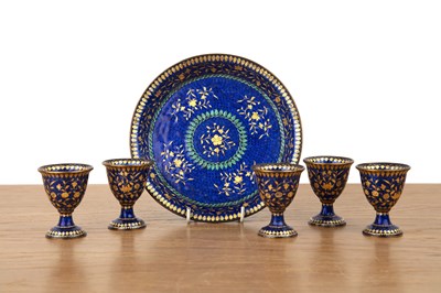 Lot 106 - Set of five Ottoman enamel zarf cups on a tray...