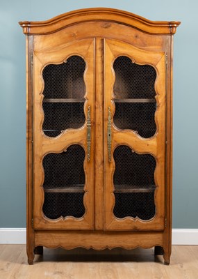 Lot 371 - A Louis XV French cherrywood bookcase