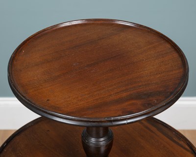 Lot 347 - A Georgian mahogany three-tier dumbwaiter
