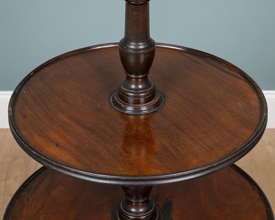 Lot 347 - A Georgian mahogany three-tier dumbwaiter