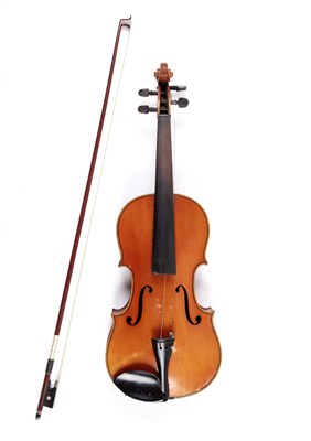 Lot 135 - A violin with two piece back, of pale brown...