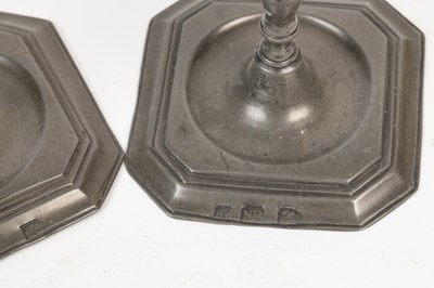 Lot 572 - A pair of antique French candlesticks and a small group of pewter