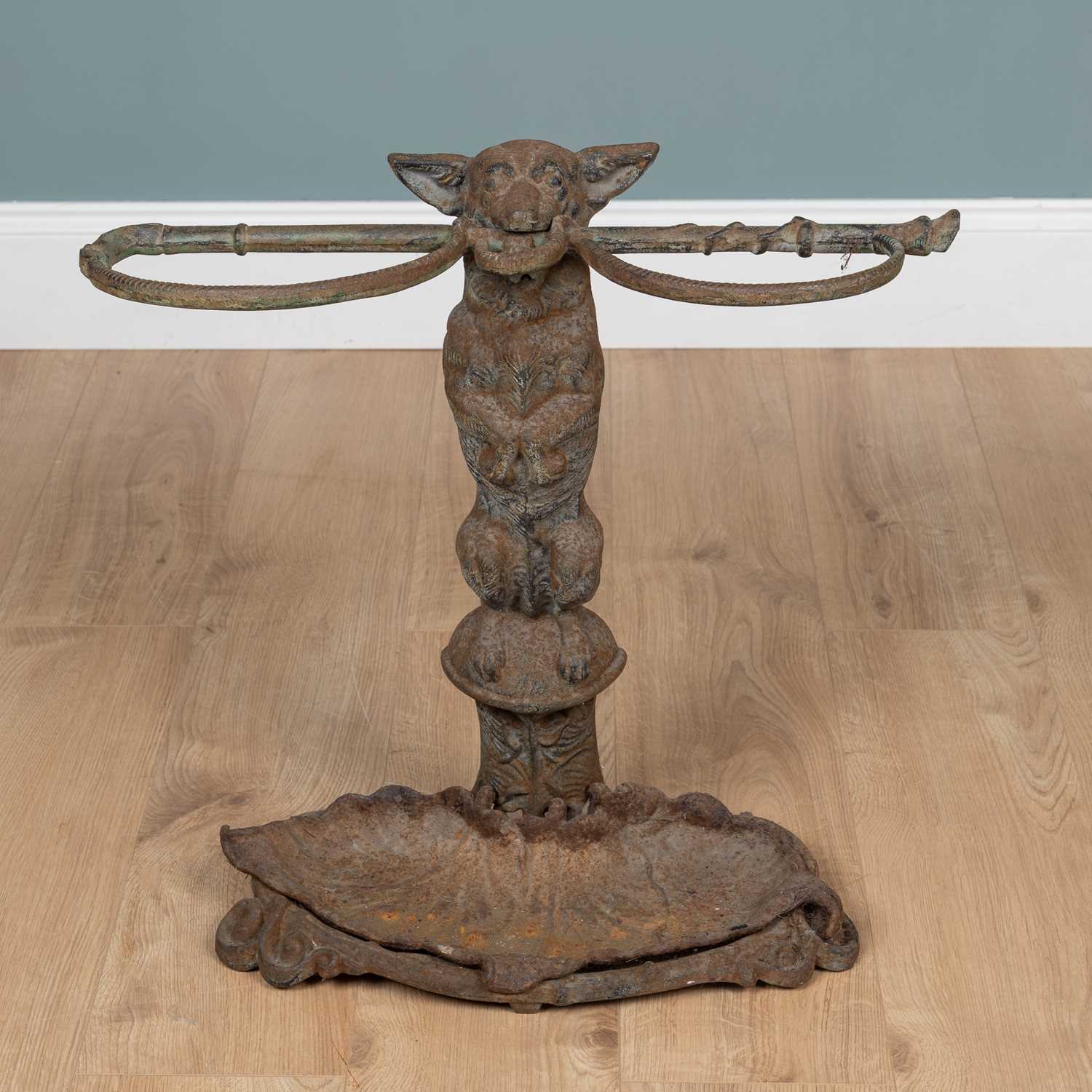 Lot 538 - A cast iron umbrella stand
