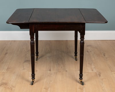 Lot 544 - A George III mahogany Chippendale-style Pembroke table
