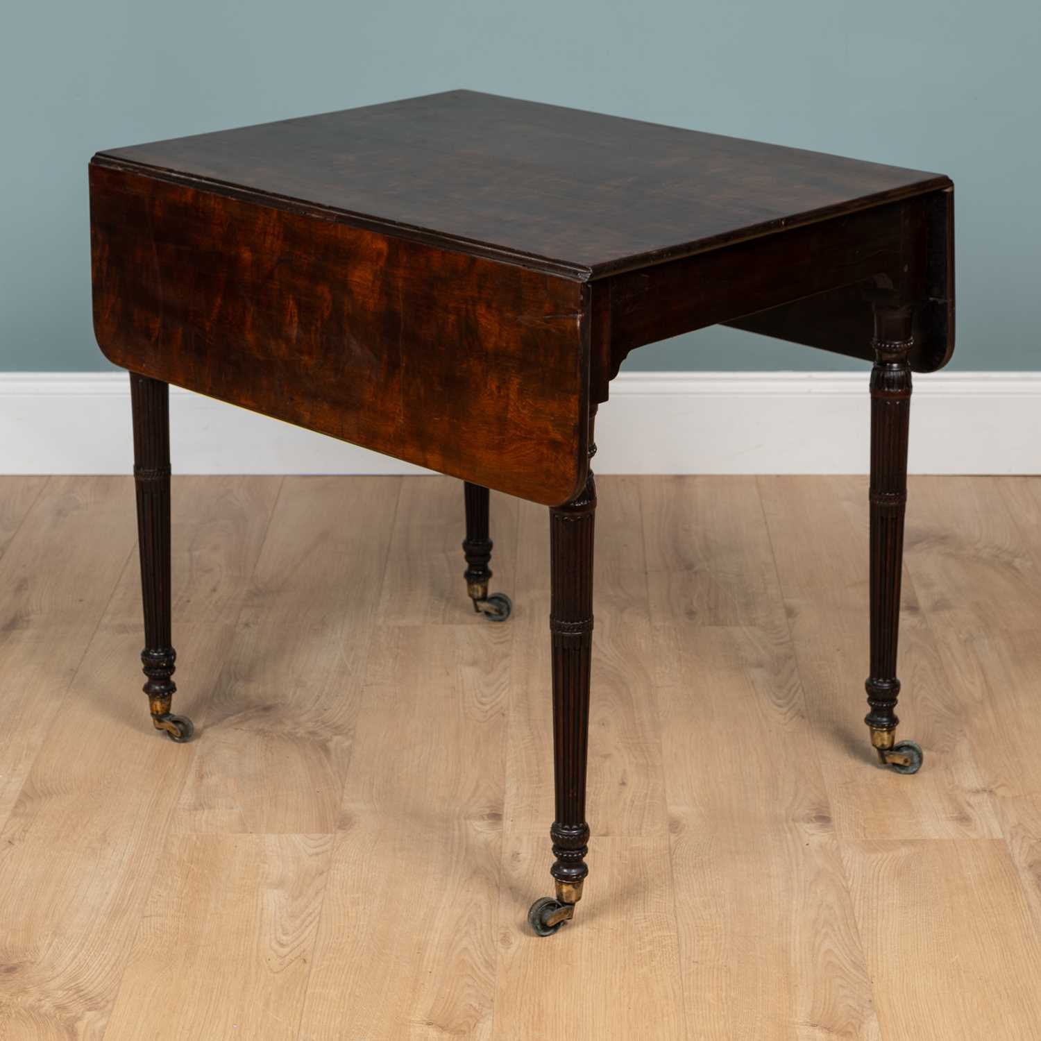 Lot 544 - A George III mahogany Chippendale-style Pembroke table