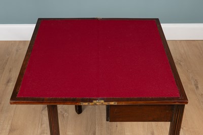 Lot 261 - A George III mahogany Chippendale-style fold-over card table