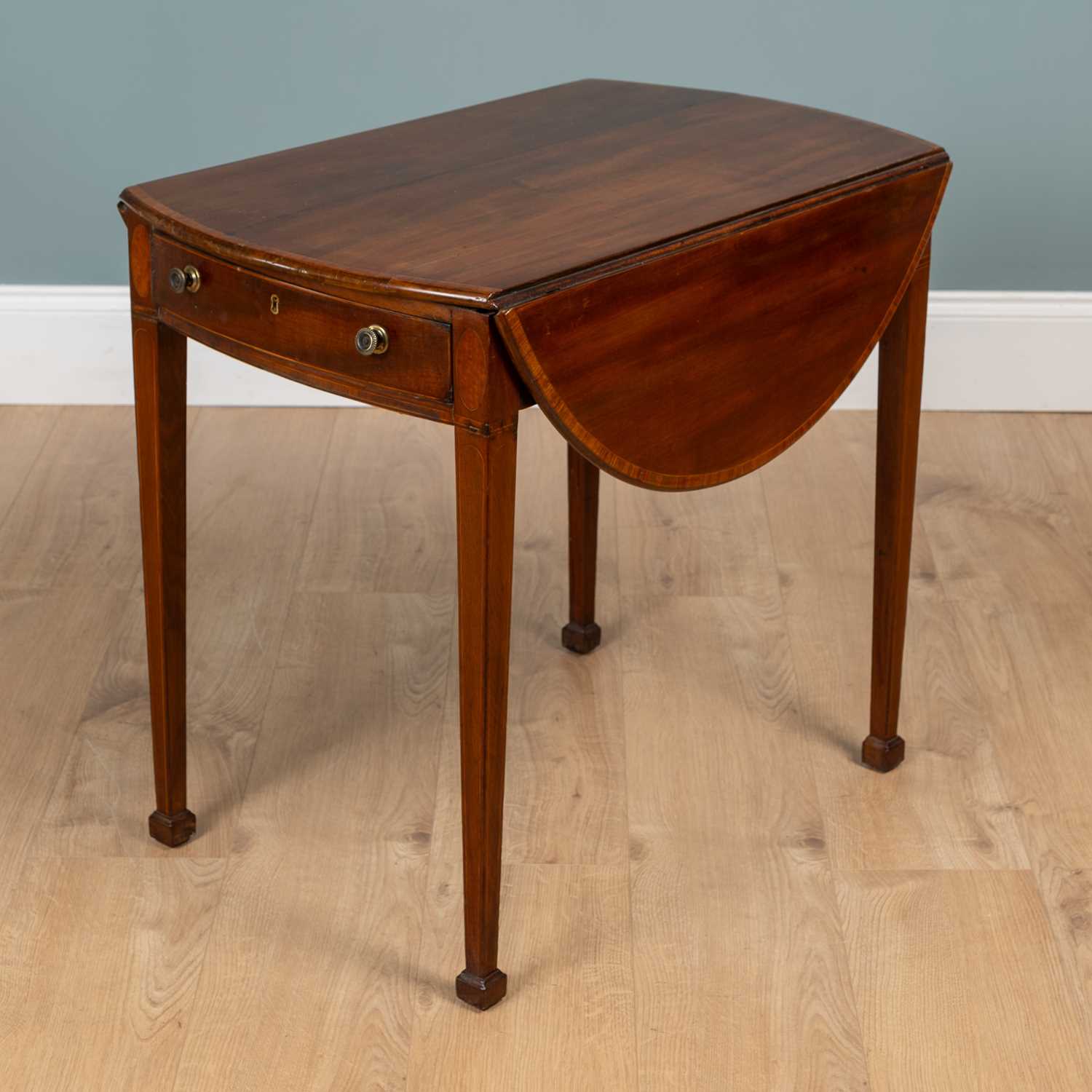 Lot 377 - A George III Hepplewhite-period oval Pembroke table