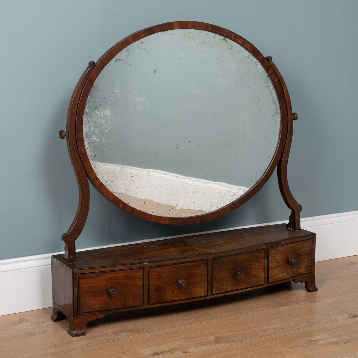 Lot 529 - A large mahogany oval dressing table mirror