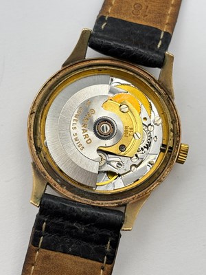 Lot 248 - A gold cased automatic wristwatch by Garrard,...