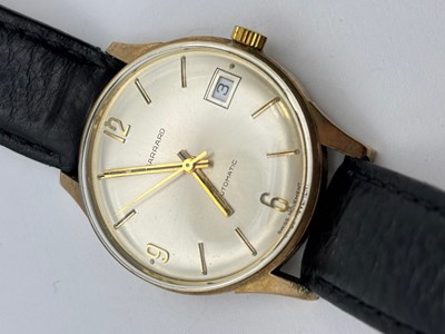 Lot 248 - A gold cased automatic wristwatch by Garrard,...