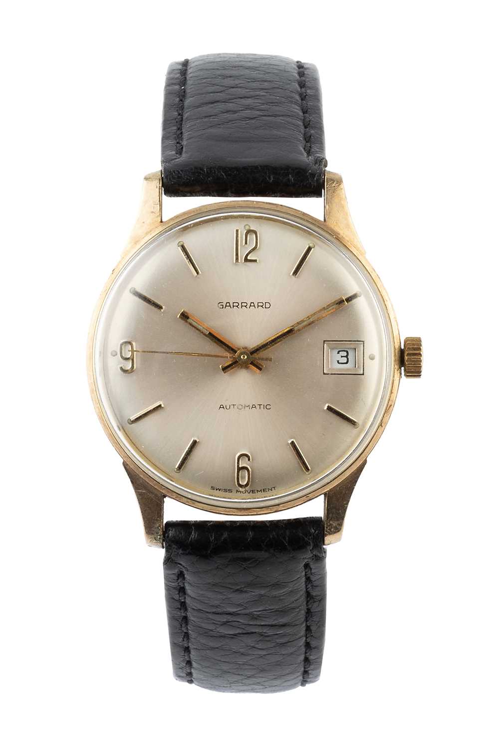Lot 248 - A gold cased automatic wristwatch by Garrard,...