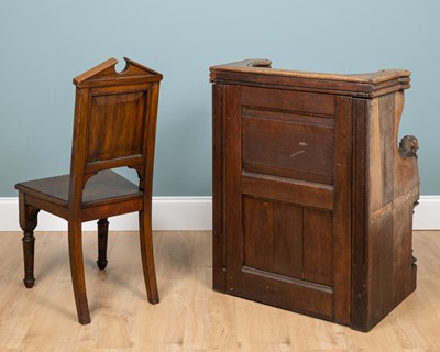 Lot 1217 - An oak choir stall and an oak chair