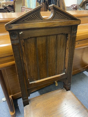 Lot 1217 - An oak choir stall and an oak chair