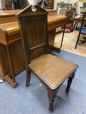 Lot 1217 - An oak choir stall and an oak chair