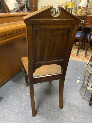 Lot 1217 - An oak choir stall and an oak chair