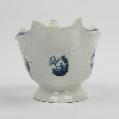Lot 1335 - A group of four 18th century blue and white porcelain gravy boats