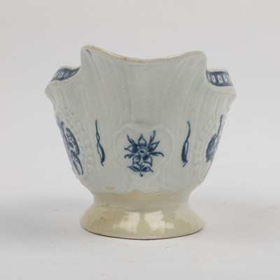 Lot 1335 - A group of four 18th century blue and white porcelain gravy boats