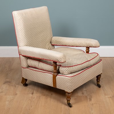 Lot 1222 - A Howard & Sons open armchair