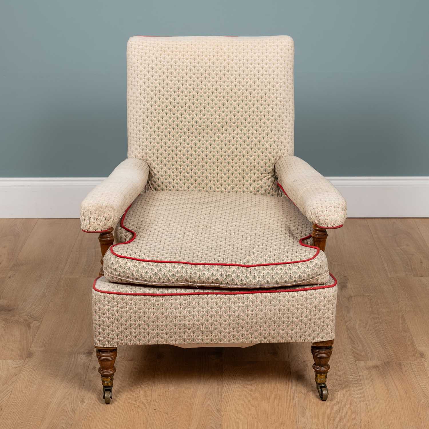 Lot 1222 - A Howard & Sons open armchair