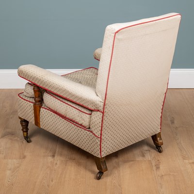 Lot 1222 - A Howard & Sons open armchair