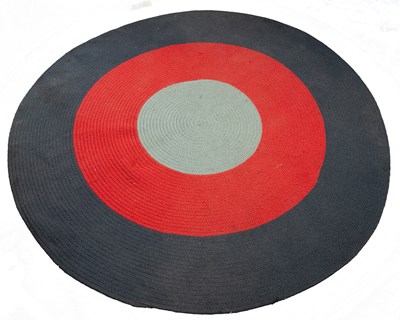 Lot 1393 - A pair of circular flat woven American style rugs