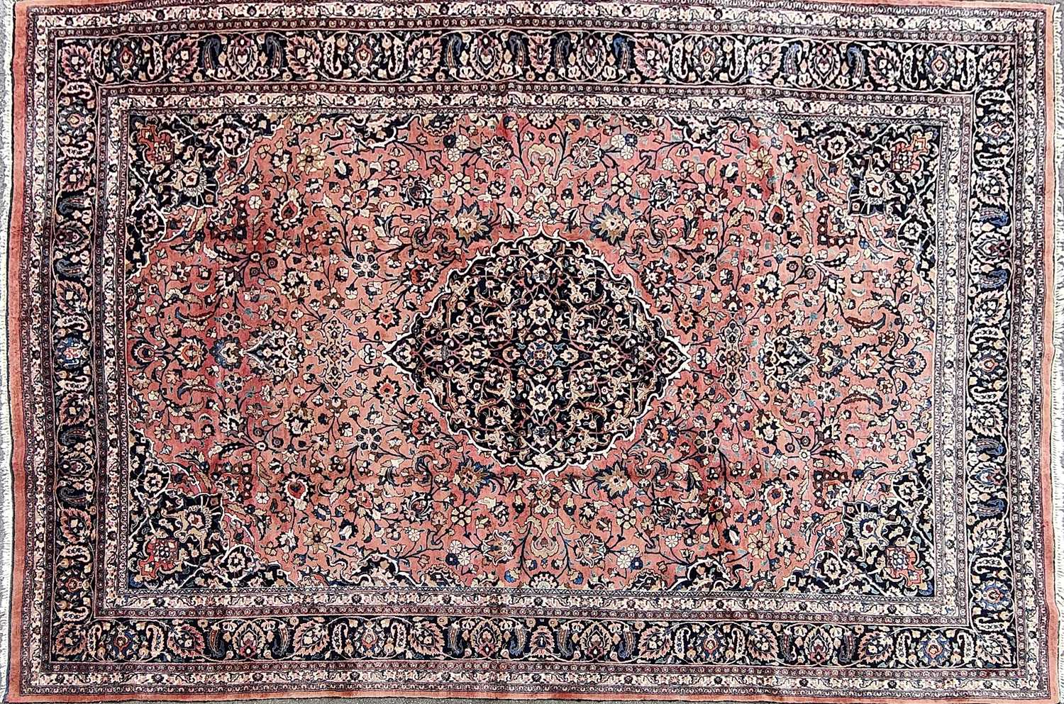 Lot 1245 - A mid-20th century hand-woven woollen Mashad-style carpet