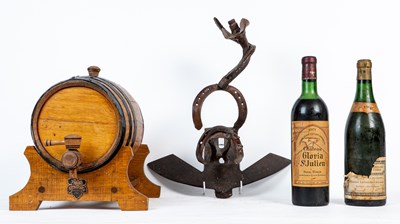 Lot 1417 - Two bottles of wine and a wine bottle stand