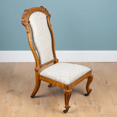 Lot 1184 - A 19th century maple-framed nursing chair