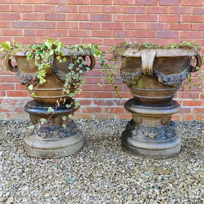 Lot 1498 - A pair of Doulton buff terracotta planters