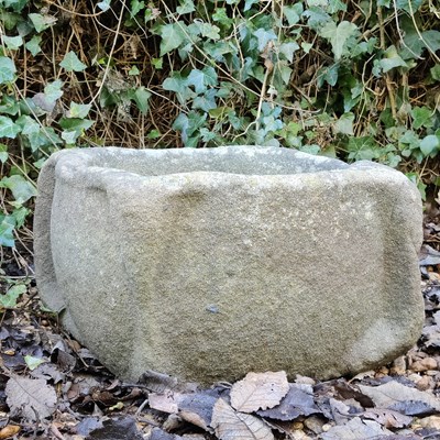Lot 1448 - An antique, possibly pre-Medieval, carved stone mortar