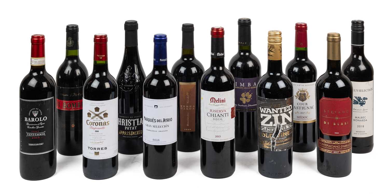Lot 1419 - Twelve bottles of red wine and a bottle rack