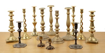 Lot 298 - Collection of pairs of brass candlesticks to...