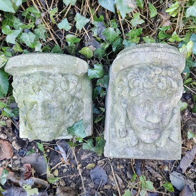 Lot 1482 - Two cast reconstituted stone corbels with female masks