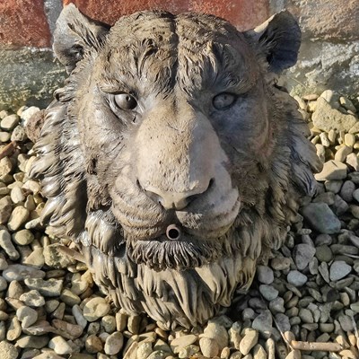 Lot 1521 - A reconstituted stone tiger mask fountainhead