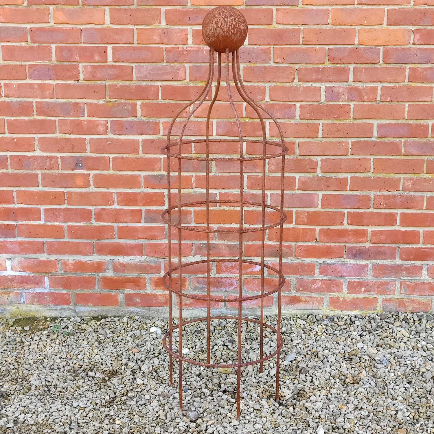 Lot 1554 - A wrought iron plant support