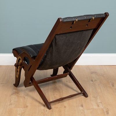 Lot 1031 - A 20th century mahogany-framed leather reclining campaign chair