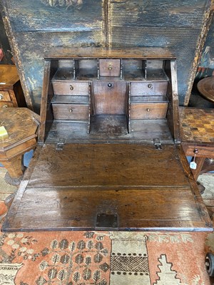 Lot 1066 - A Georgian oak bureau