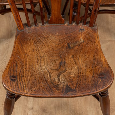 Lot 1057 - A harlequin set of six yew and elm Windsor chairs