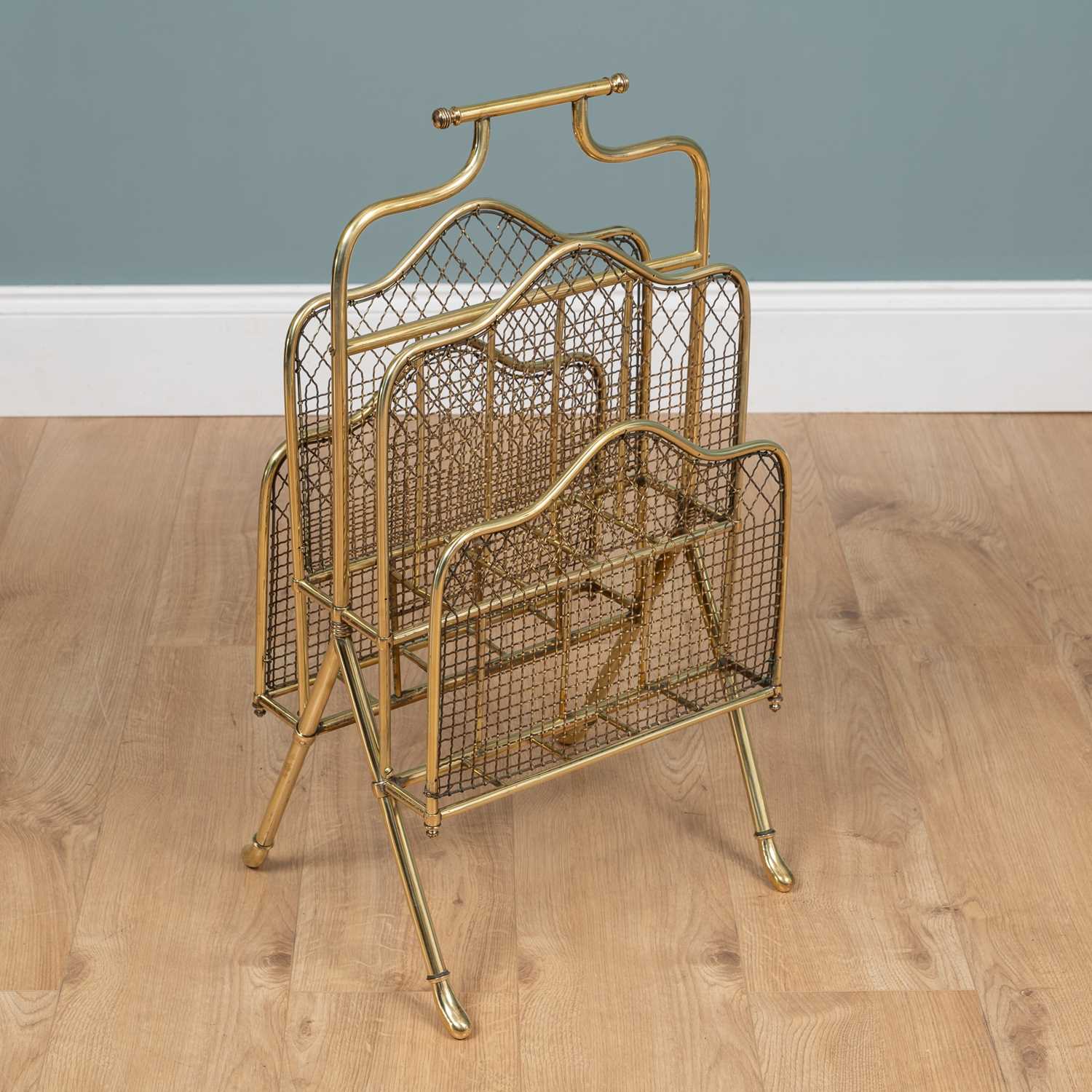 Lot 286 - A Victorian brass magazine rack
