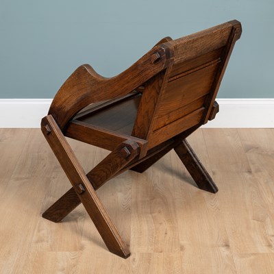 Lot 1174 - An old oak Glastonbury-style chair