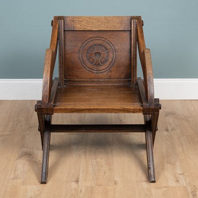 Lot 1174 - An old oak Glastonbury-style chair