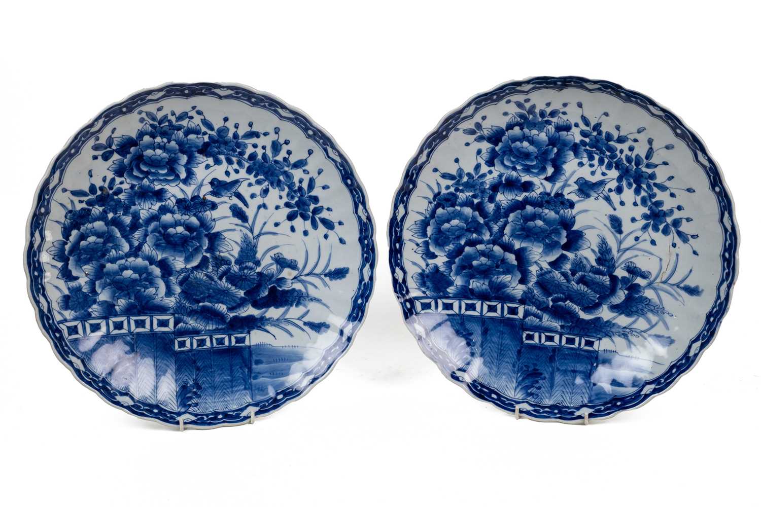 Lot 425 - A pair of late 19th century Japanese blue and white chargers